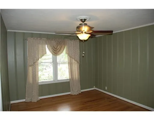 a view of windows and chandelier in a room