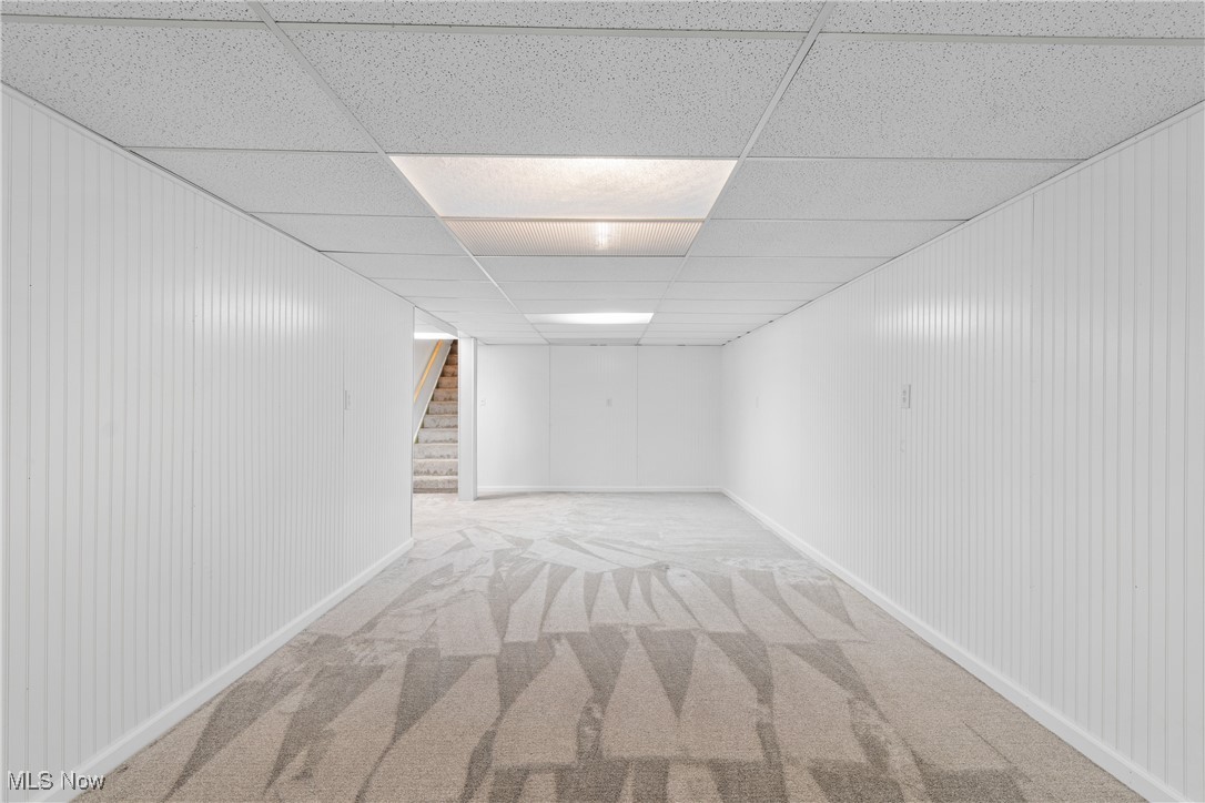 1067 Munroe Falls Kent Road Kent, OH 44240 - Photo 21 of 31 Empty room with a drop ceiling and carpet flooring