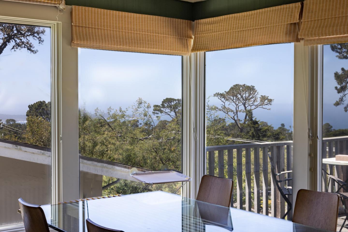 24760 Lower Trail Carmel, CA 93923 - Photo 4 of 5 a view of a balcony with chair and table in the patio