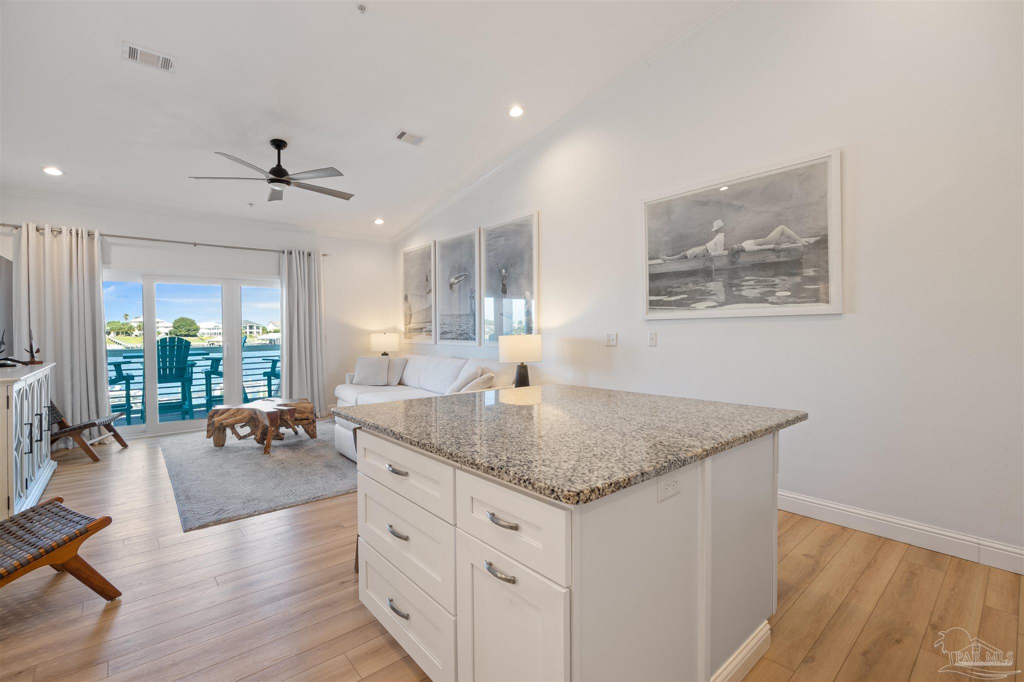 17290 Perdido Key Drive, Unit B2 Pensacola, FL 32507 - Photo 17 of 54 a view of living room with granite countertop furniture and fireplace