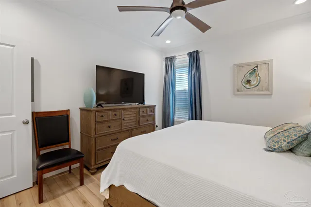 a bathroom with a double vanity sink mirror and shower