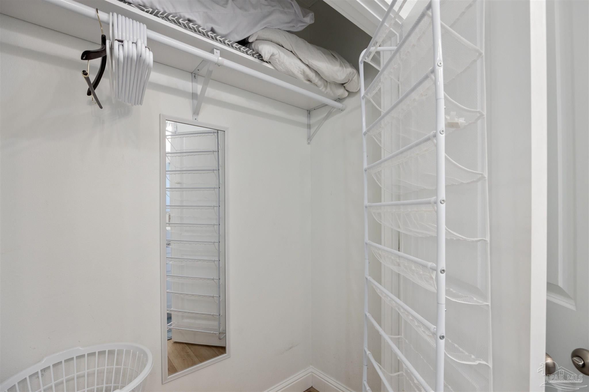 17290 Perdido Key Drive, Unit B2 Pensacola, FL 32507 - Photo 27 of 54 a view of walk in closet