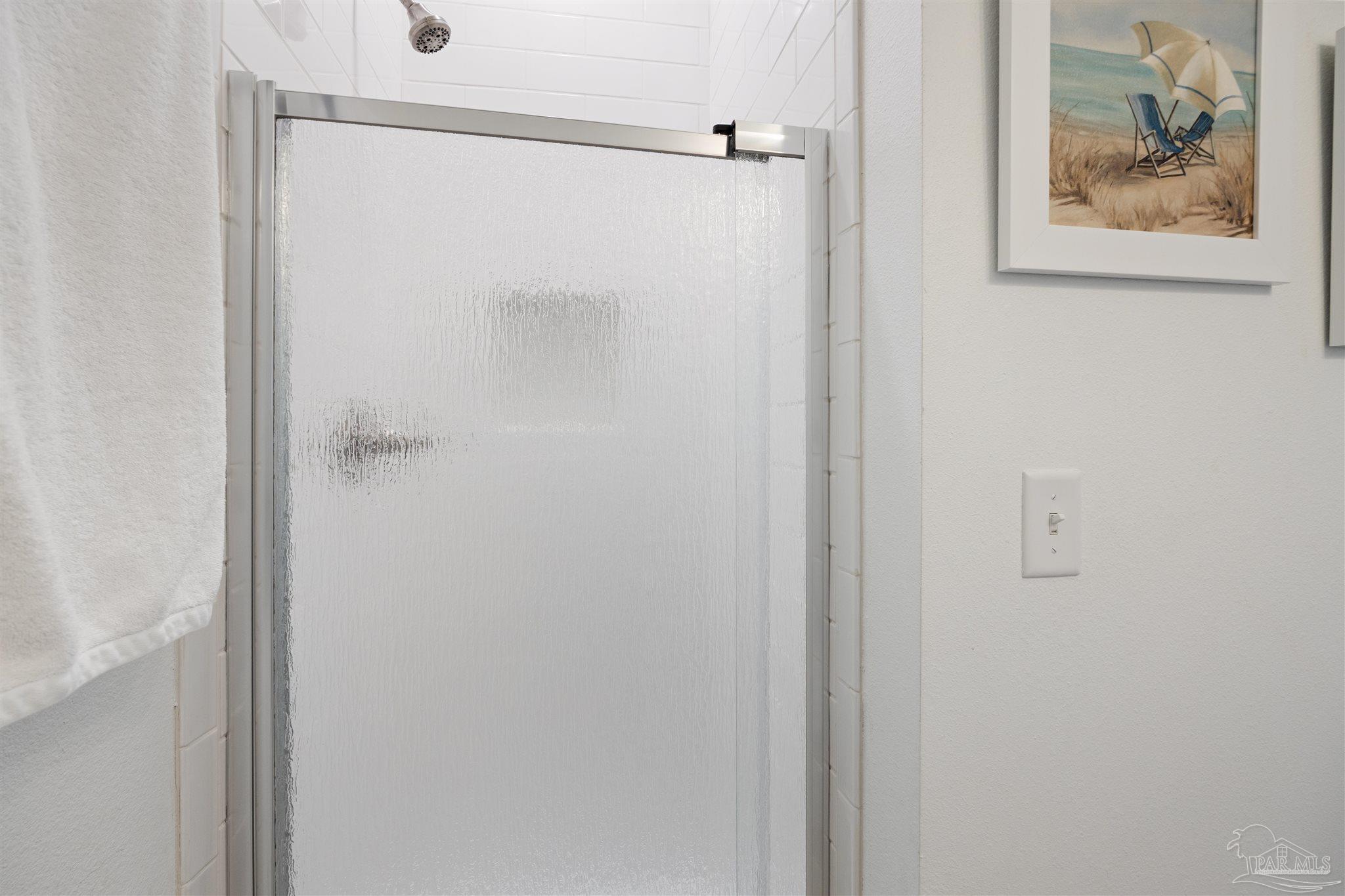 17290 Perdido Key Drive, Unit B2 Pensacola, FL 32507 - Photo 30 of 54 a bathroom with a shower