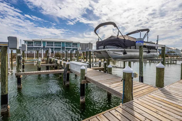 a view of a lake with outdoor seating