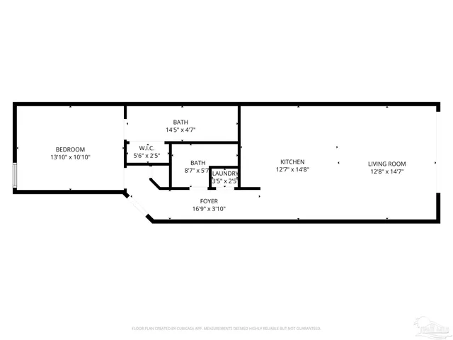 an aerial view of a house with a ocean view