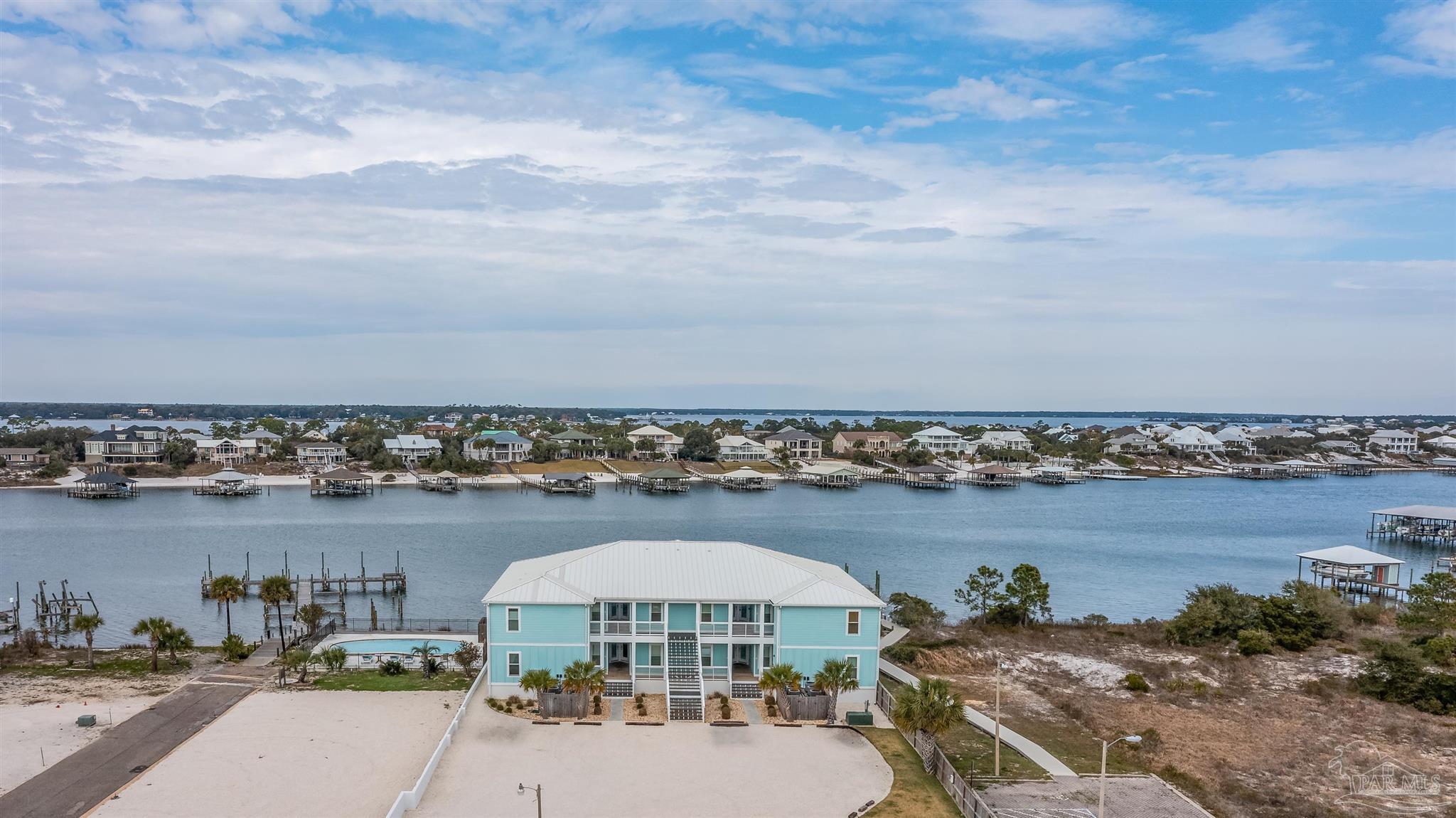 17290 Perdido Key Drive, Unit B2 Pensacola, FL 32507 - Photo 49 of 54 a view of a lake with tall buildings
