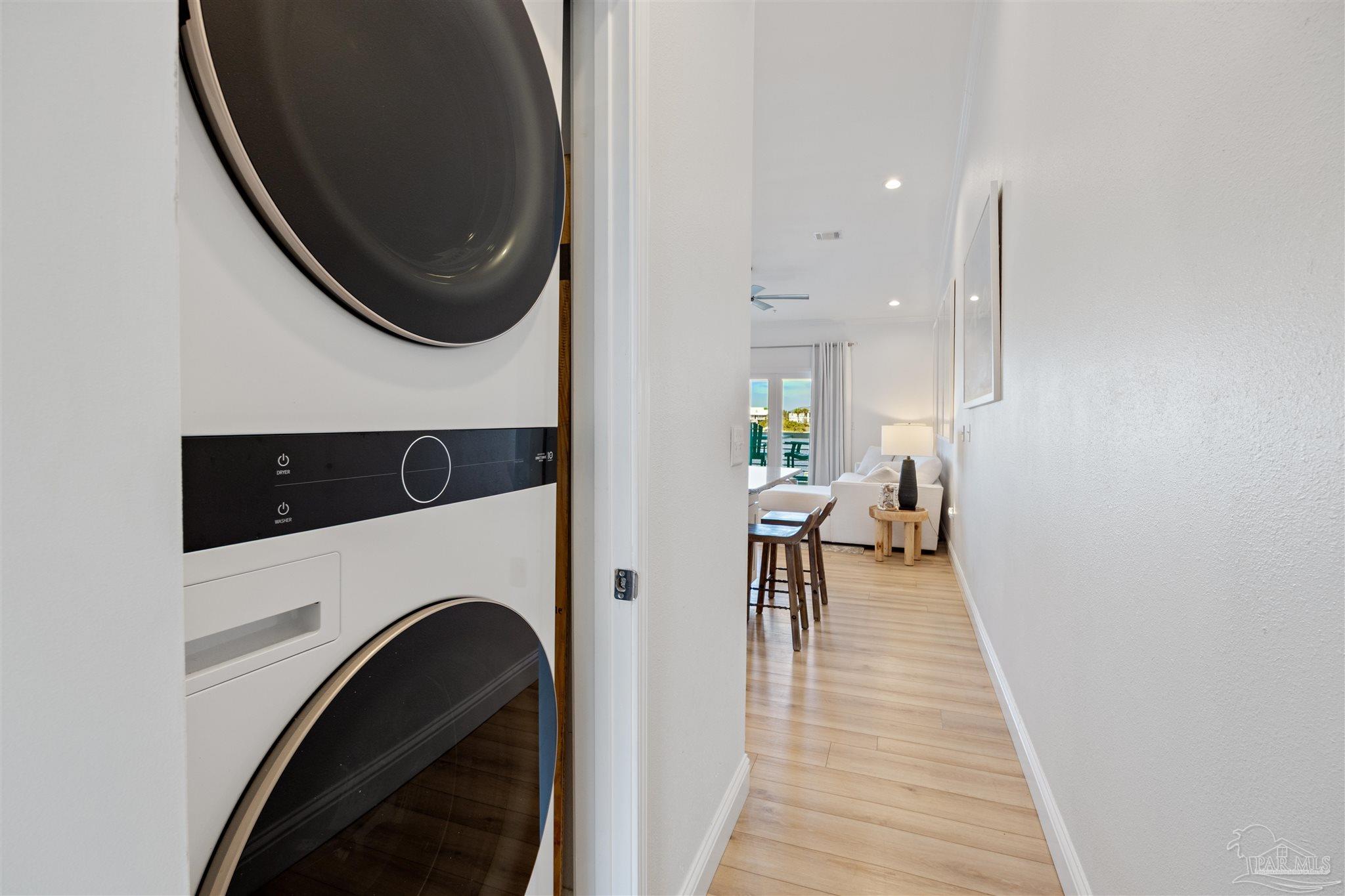 17290 Perdido Key Drive, Unit B2 Pensacola, FL 32507 - Photo 5 of 54 a view of a hallway with washer and dryer