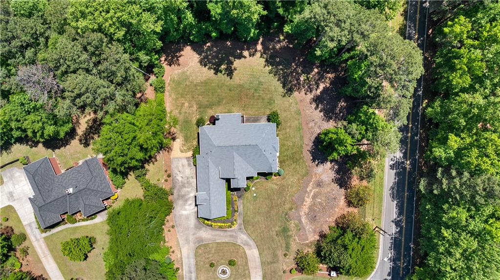 915 Magnolia Way Hampton, GA 30228 - Photo 4 of 68 an aerial view of house with yard and swimming pool