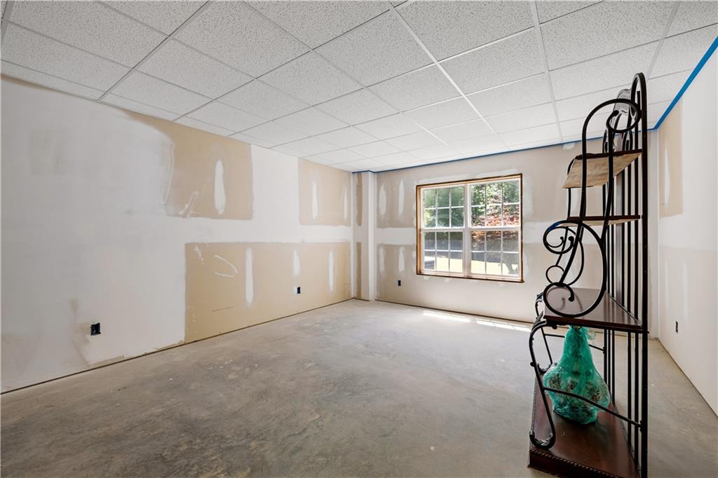 915 Magnolia Way Hampton, GA 30228 - Photo 56 of 68 a view of an empty room with windows