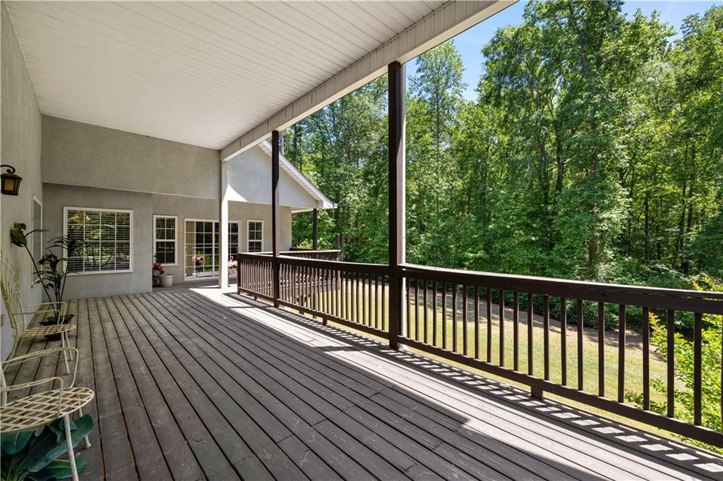 915 Magnolia Way Hampton, GA 30228 - Photo 60 of 68 a view of a wooden chairs on the roof deck