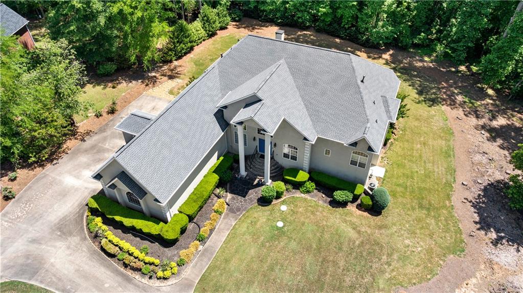 915 Magnolia Way Hampton, GA 30228 - Photo 6 of 68 an aerial view of a house with a swimming pool