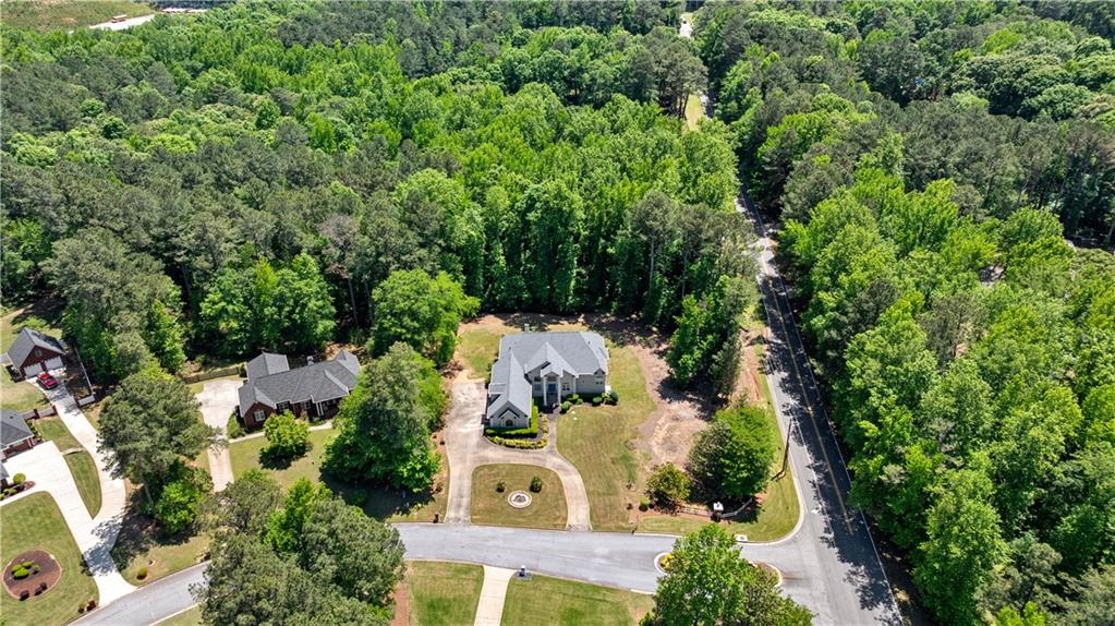 915 Magnolia Way Hampton, GA 30228 - Photo 66 of 68 an aerial view of a house with a yard
