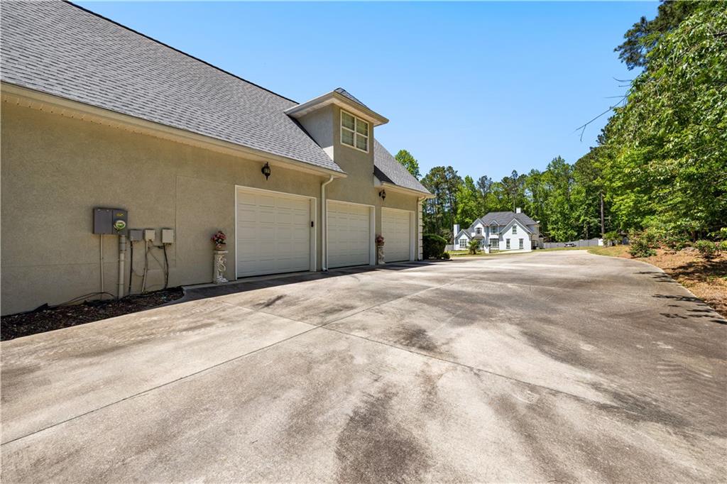915 Magnolia Way Hampton, GA 30228 - Photo 10 of 68 a view of a house with a yard