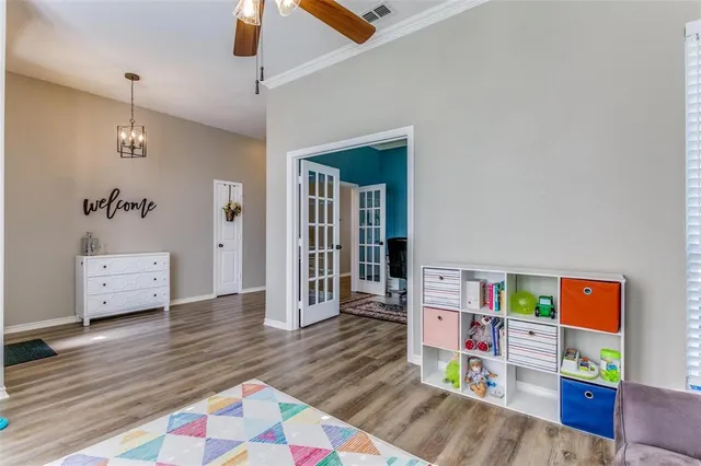 a view of a chairs and table in the patio