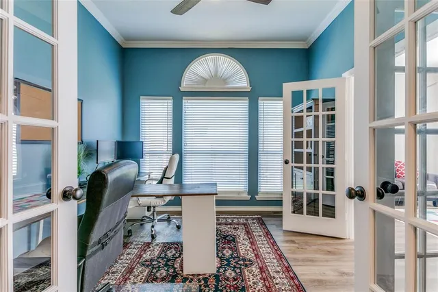 a front view of a house with outdoor seating