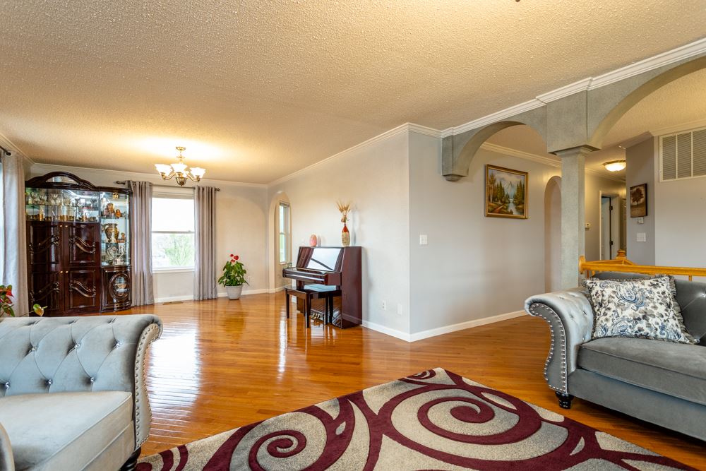 152 Millers Road Bridgewater, VA 22812 - Photo 17 of 50 a living room with furniture and a dining table with kitchen view