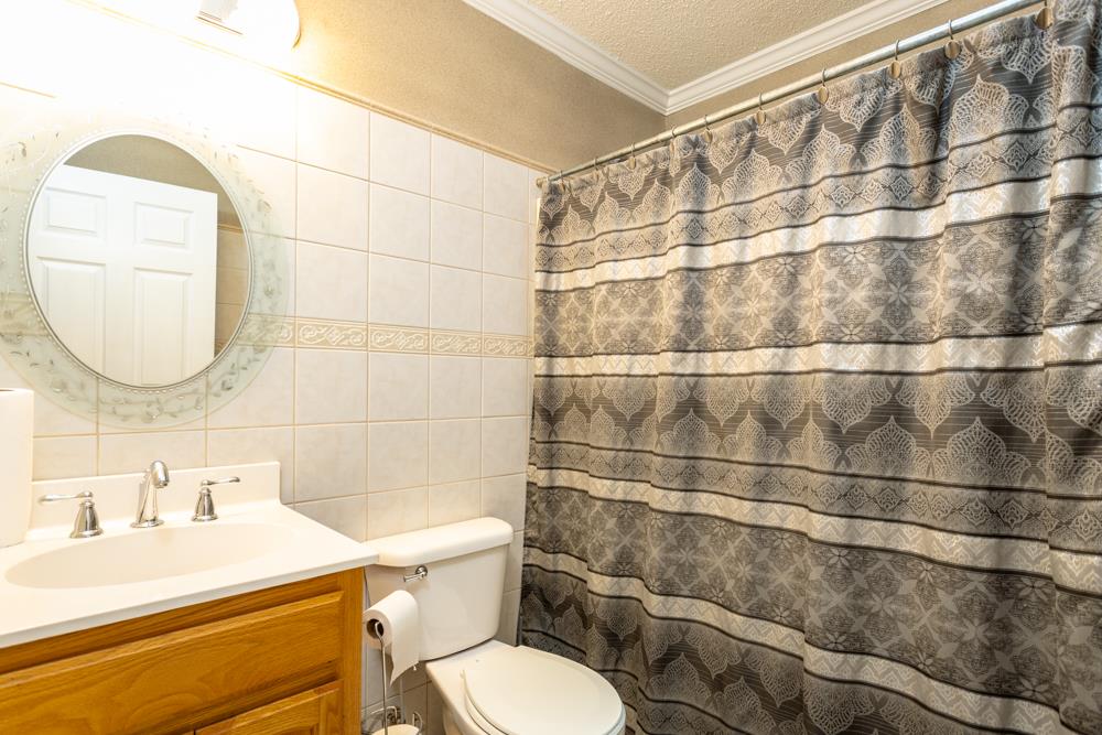 152 Millers Road Bridgewater, VA 22812 - Photo 23 of 50 a bathroom with a sink mirror toilet and shower