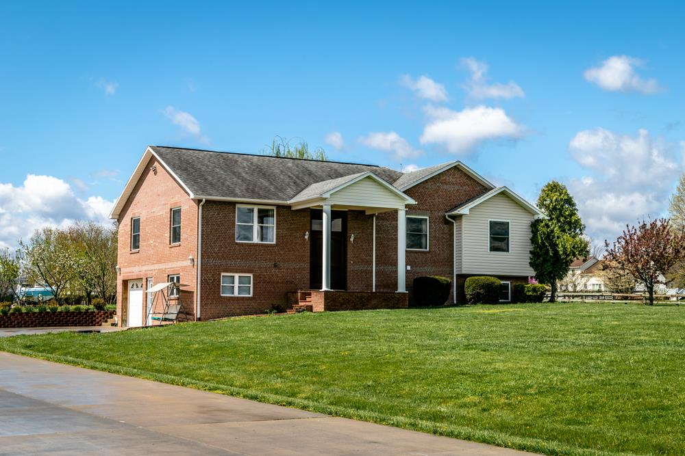 152 Millers Road Bridgewater, VA 22812 - Photo 40 of 50 a front view of a house with a yard and garage