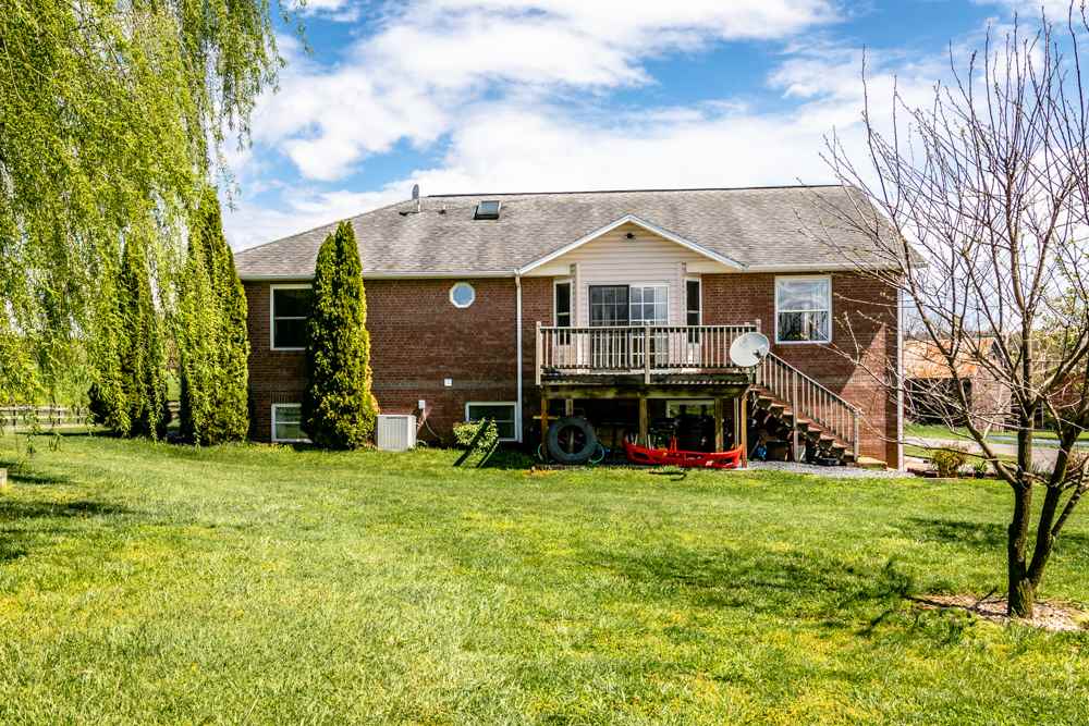 152 Millers Road Bridgewater, VA 22812 - Photo 45 of 50 a view of a house with a big yard and large trees