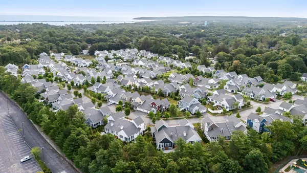 an aerial view of a city with lots of residential buildings