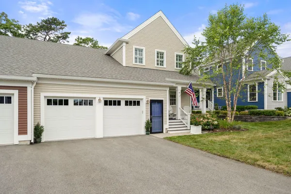 front view of house with a yard