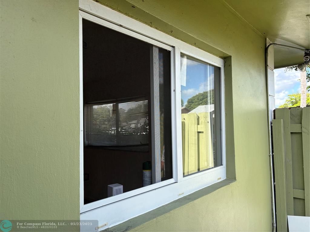7659 Northwest 74th Avenue Tamarac, FL 33321 - Photo 2 of 11 a view of a front door