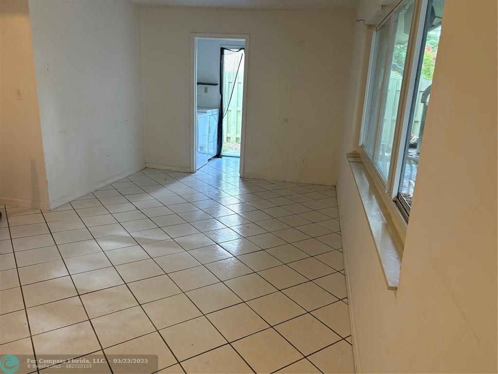 7659 Northwest 74th Avenue Tamarac, FL 33321 - Photo 9 of 11 a view of an empty room and staircase