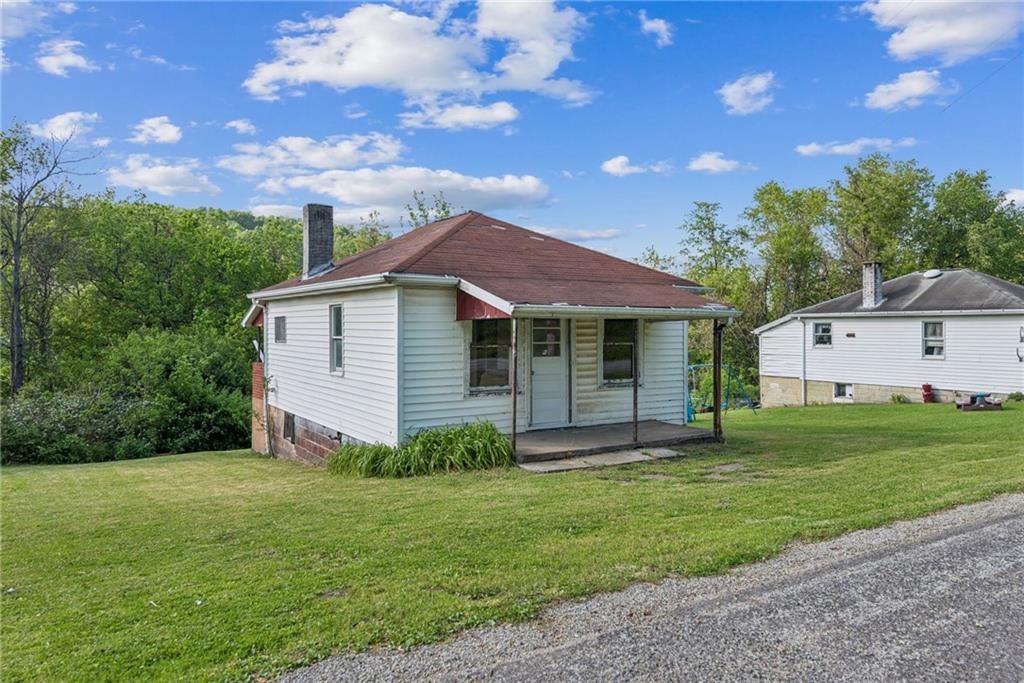 375 Reduction Road Smithton, PA 15479 - Photo 26 of 30 a view of a house with a yard