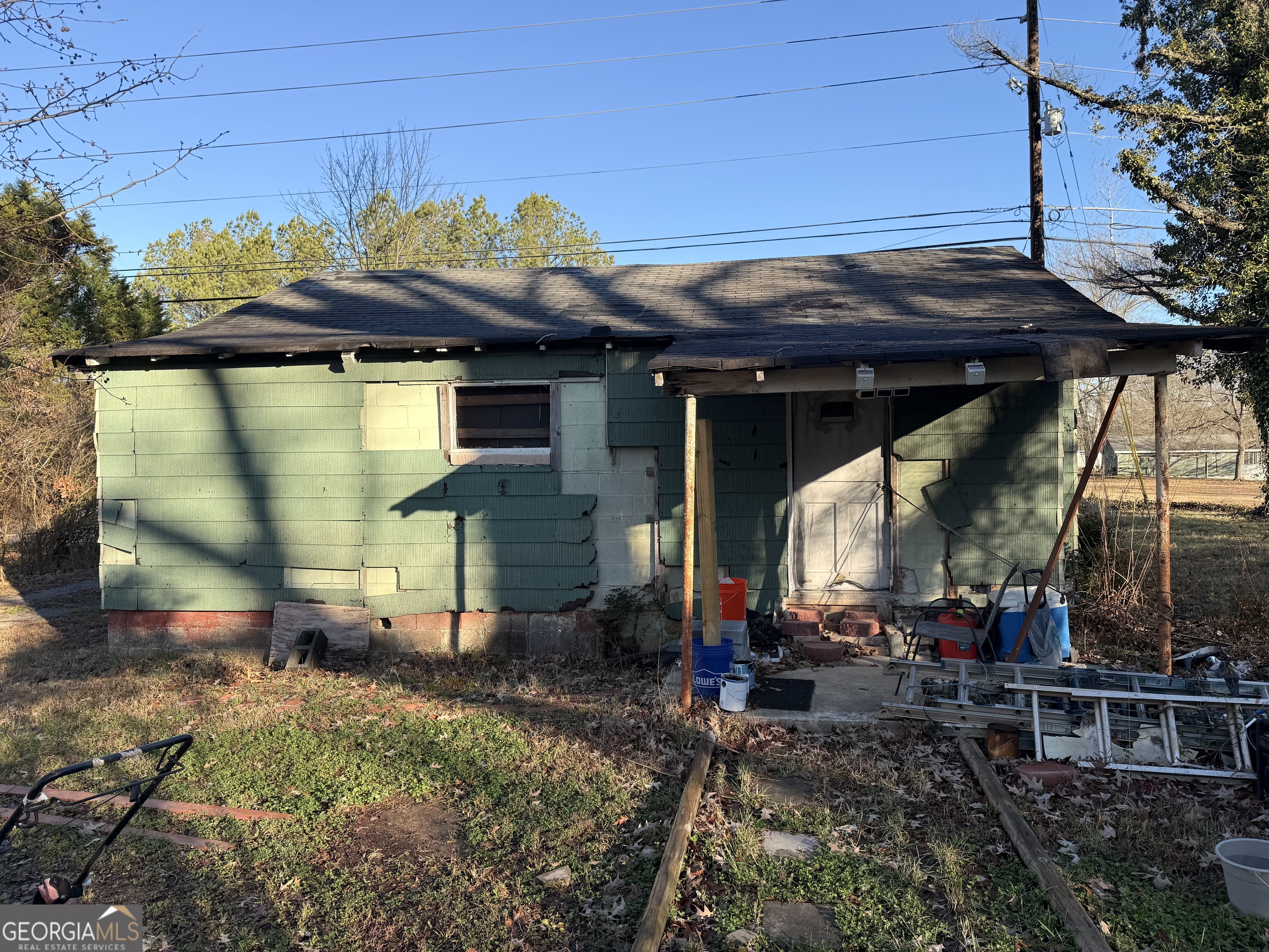 4243 Alabama Highway Rome, GA 30165 - Photo 2 of 3 a view of a house with a backyard
