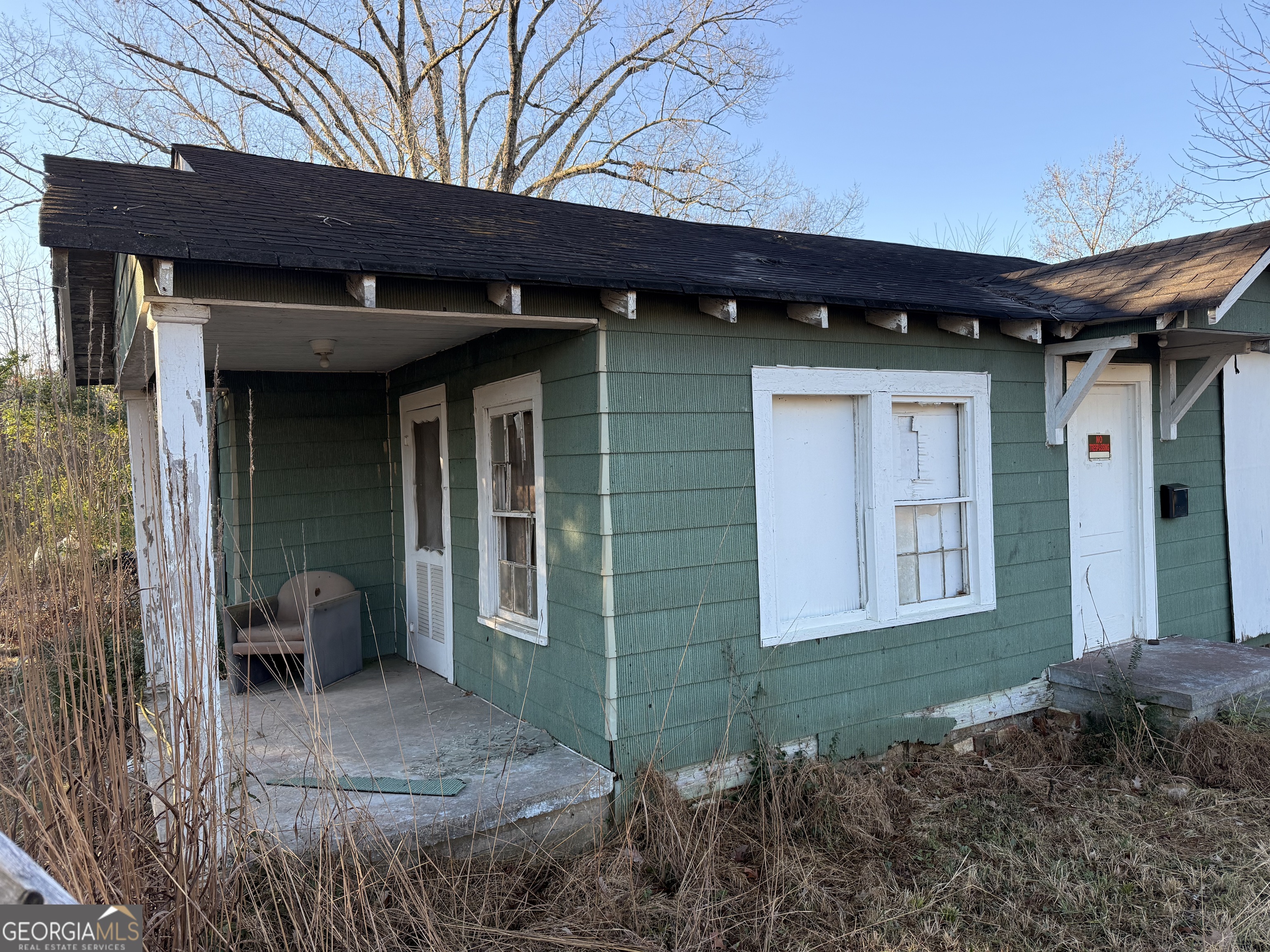 4243 Alabama Highway Rome, GA 30165 - Photo 3 of 3 a view of a house with a yard and seating space