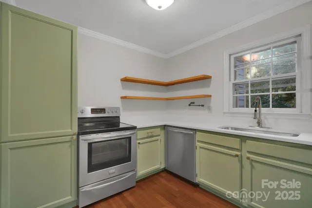 a kitchen with a refrigerator and sink