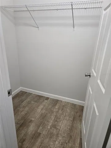 a view of a room with racks on the wall