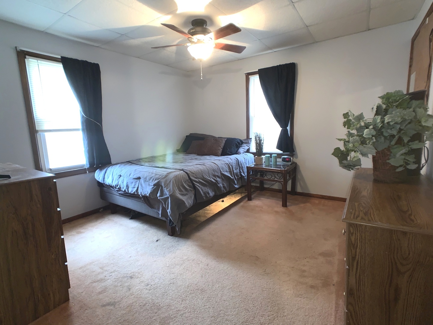 608 West Cleveland Street Spring Valley, IL 61362 - Photo 19 of 35 a bed sitting in a bedroom next to a window