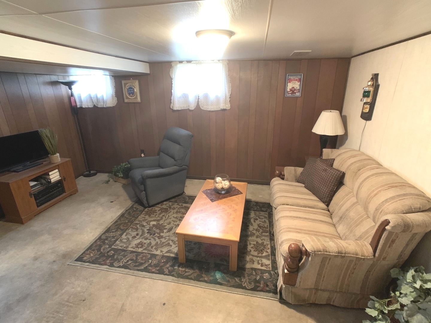 608 West Cleveland Street Spring Valley, IL 61362 - Photo 23 of 35 a living room with furniture and a flat screen tv