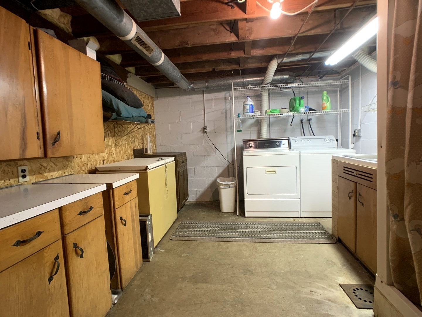 608 West Cleveland Street Spring Valley, IL 61362 - Photo 26 of 35 a utility room with cabinets washer and dryer