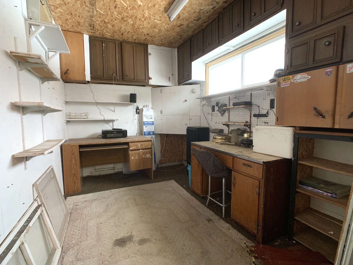 608 West Cleveland Street Spring Valley, IL 61362 - Photo 34 of 35 a kitchen with a stove a sink and a microwave