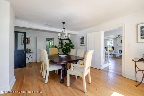 a view of a livingroom with furniture and windows