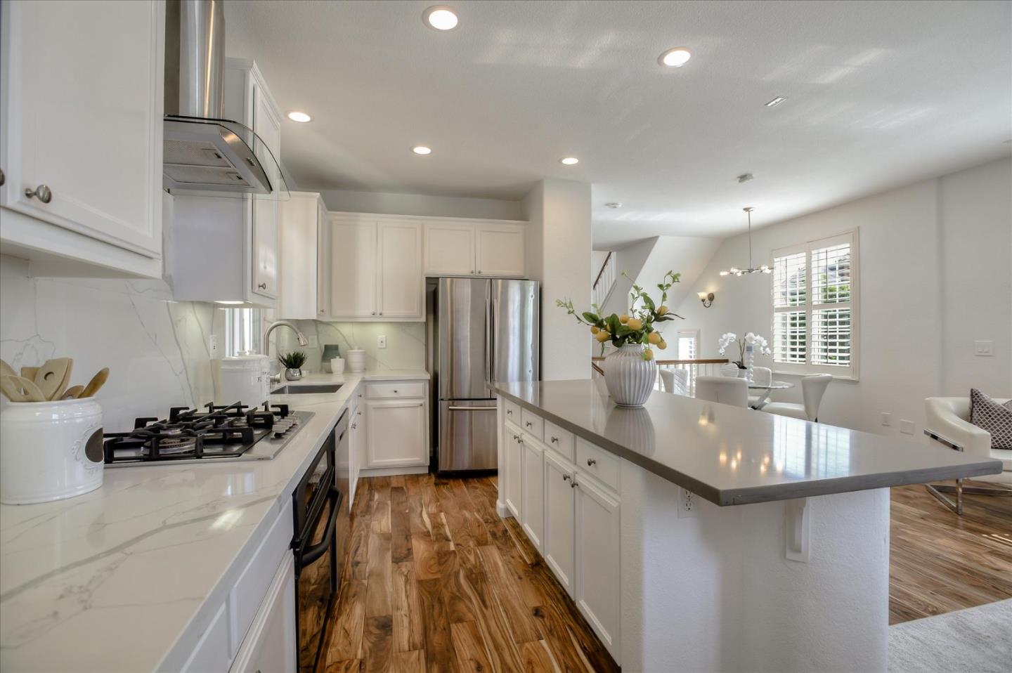 4203 Tobin Circle Santa Clara, CA 95054 - Photo 13 of 33 a kitchen with stainless steel appliances granite countertop a sink stove and refrigerator