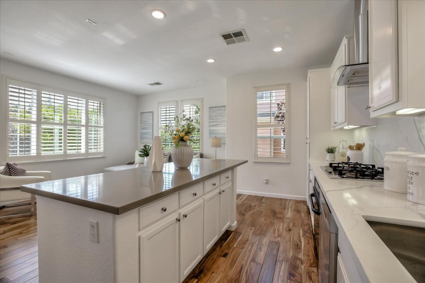 4203 Tobin Circle Santa Clara, CA 95054 - Photo 14 of 33 a kitchen with granite countertop a sink stove and cabinets