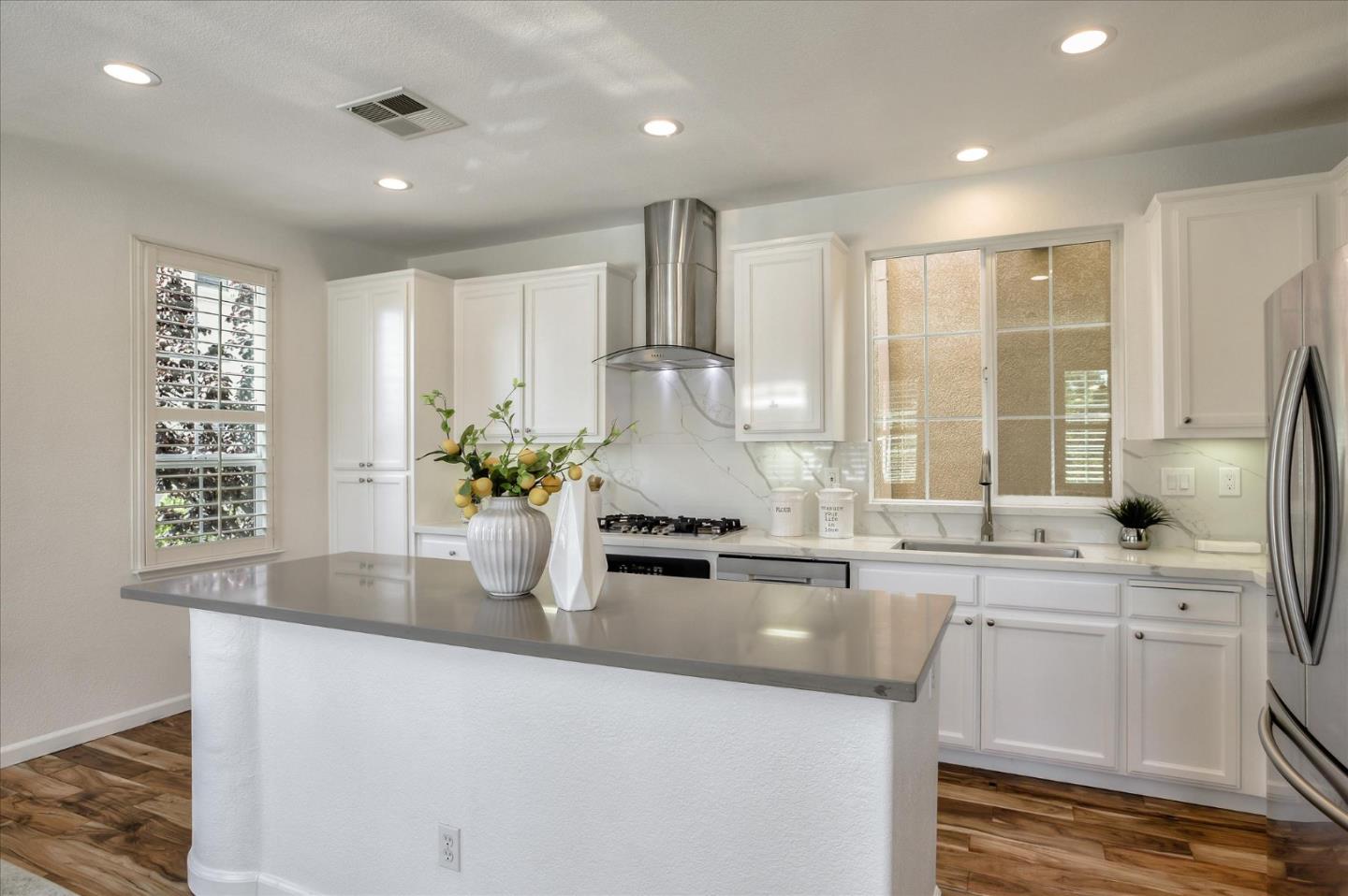 4203 Tobin Circle Santa Clara, CA 95054 - Photo 15 of 33 a kitchen with stainless steel appliances granite countertop a sink stove and cabinets