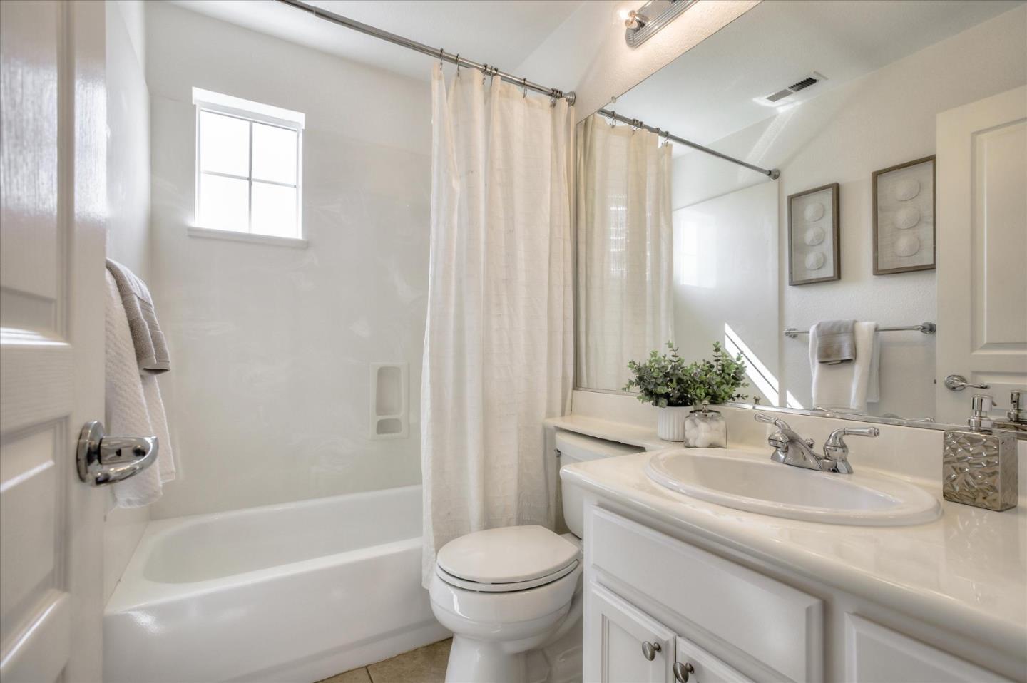 4203 Tobin Circle Santa Clara, CA 95054 - Photo 24 of 33 a bathroom with a granite countertop sink toilet and shower