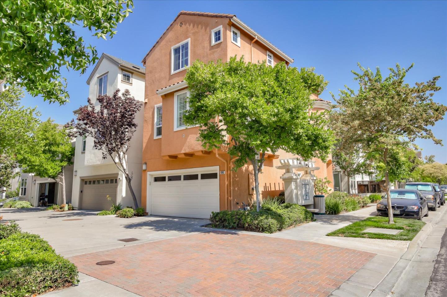 4203 Tobin Circle Santa Clara, CA 95054 - Photo 28 of 33 a front view of a house with a yard and garage