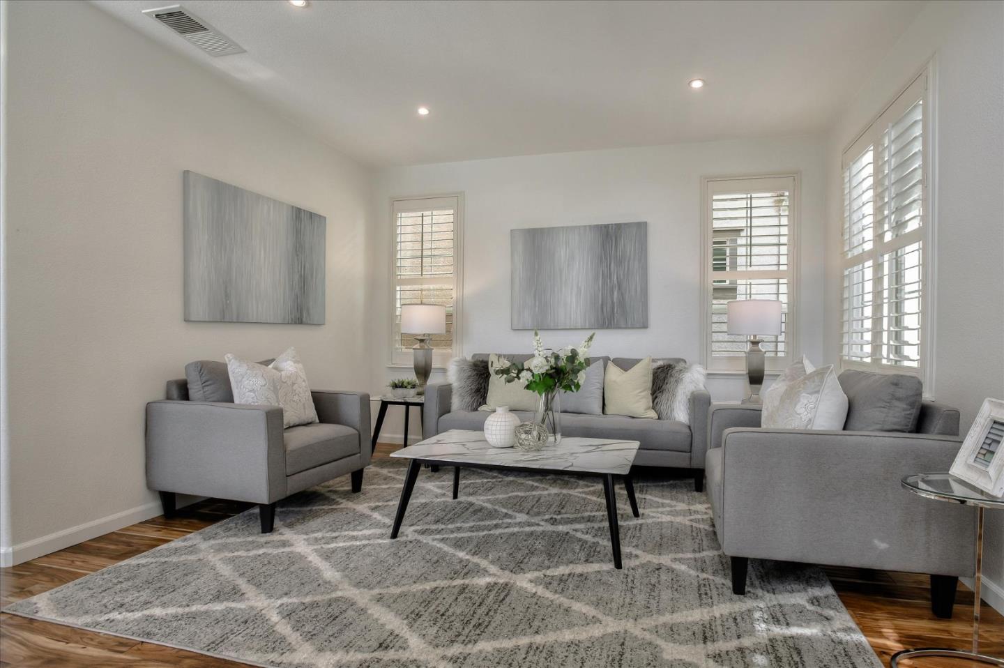4203 Tobin Circle Santa Clara, CA 95054 - Photo 4 of 33 a living room with furniture and a large window
