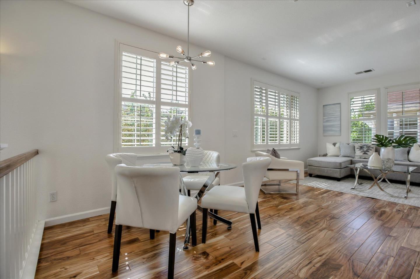 4203 Tobin Circle Santa Clara, CA 95054 - Photo 7 of 33 a living room with furniture and a large window