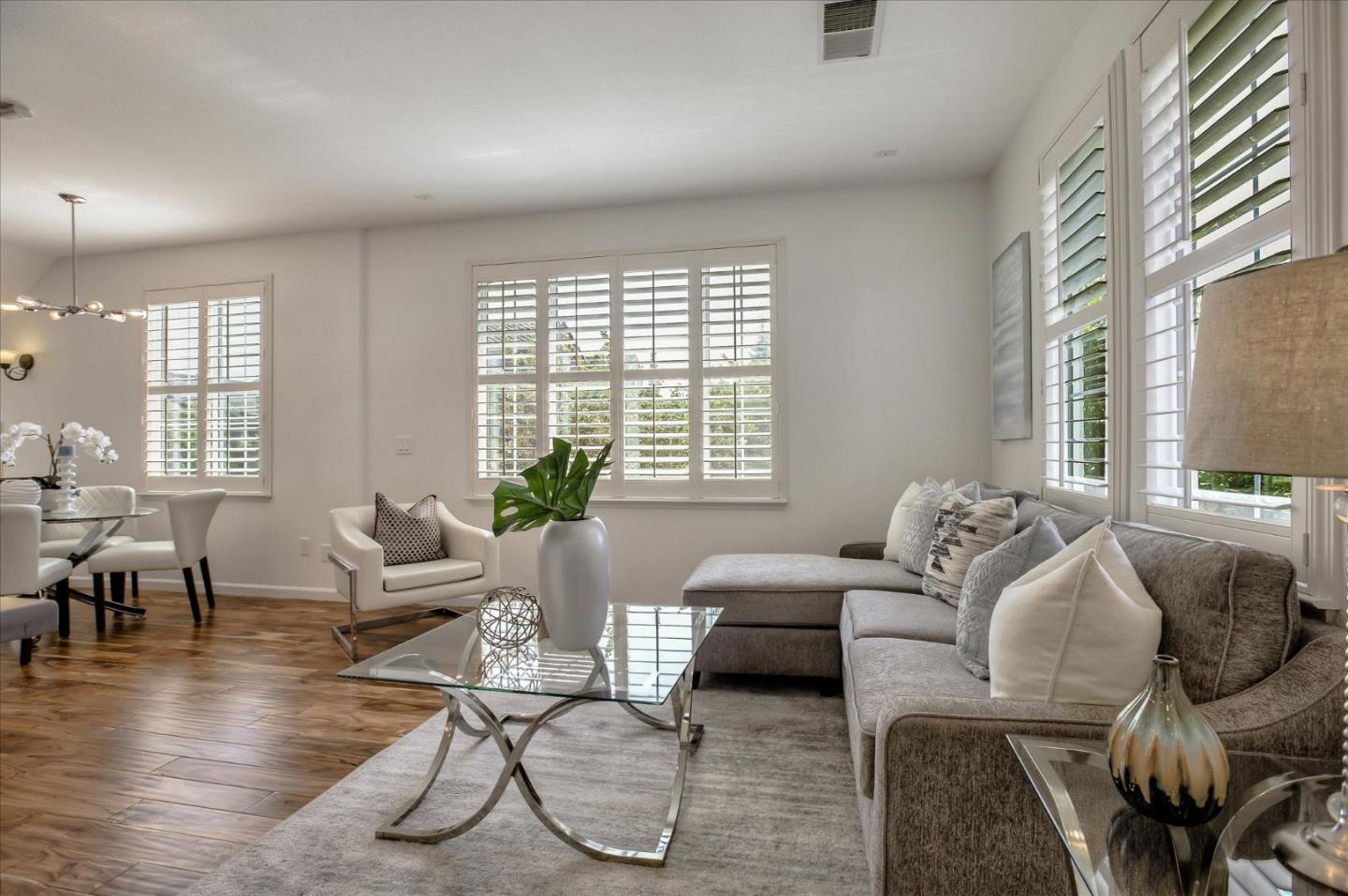 4203 Tobin Circle Santa Clara, CA 95054 - Photo 9 of 33 a living room with furniture and a large window