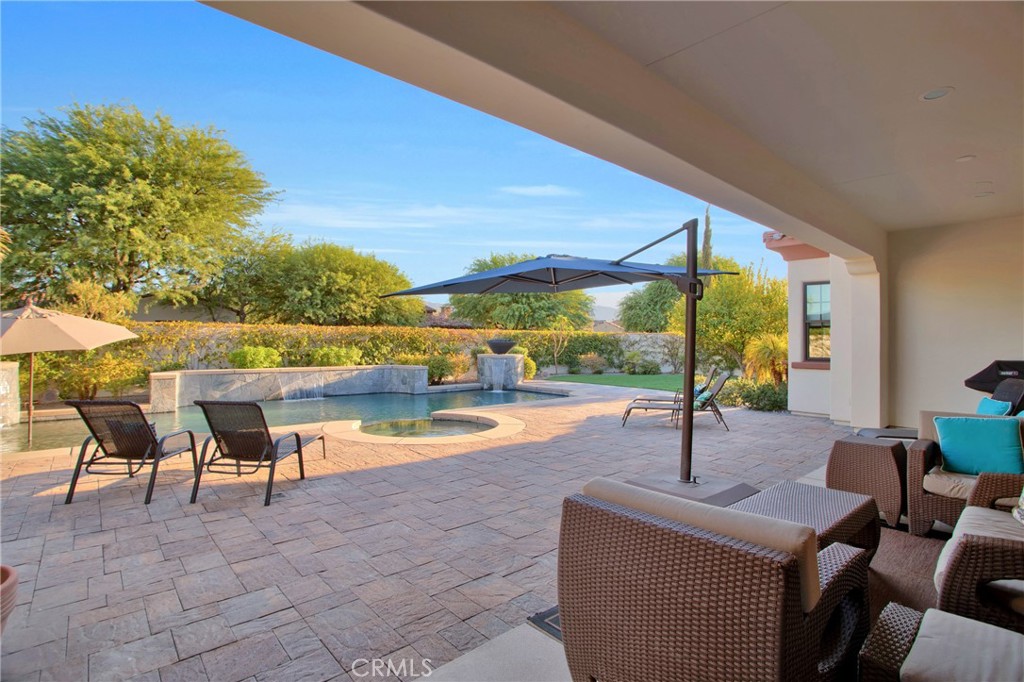 6 Cassis Circle Rancho Mirage, CA 92270 - Photo 57 of 74 a view of swimming pool with outdoor seating and plants