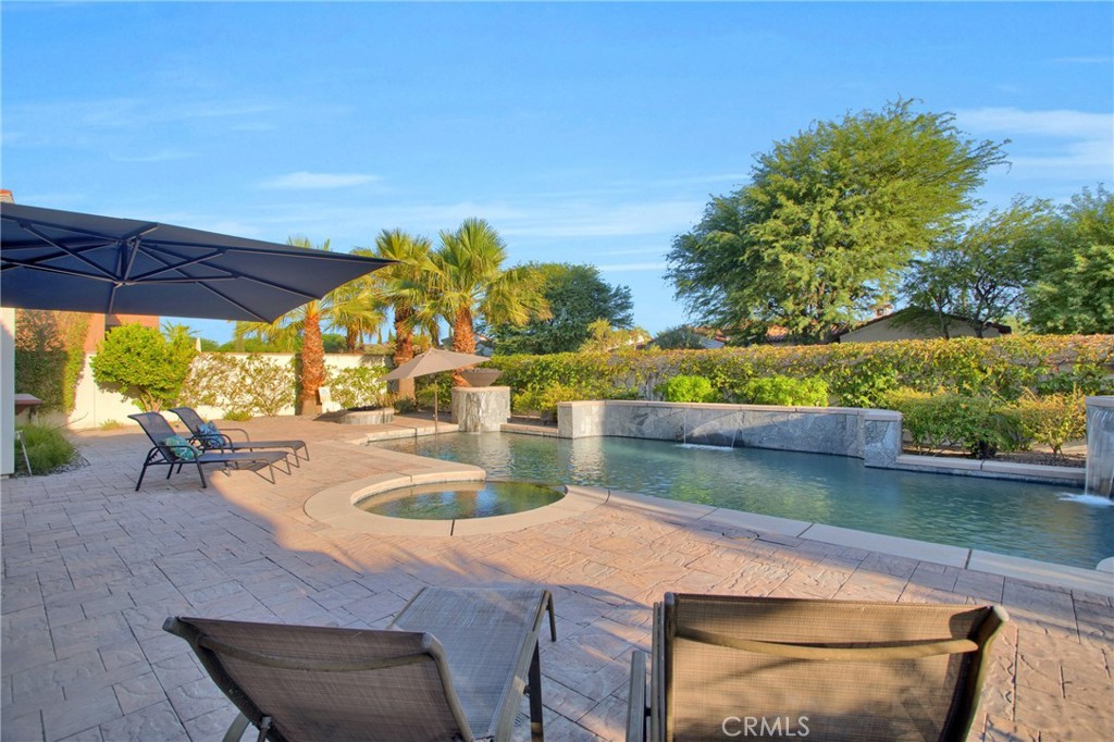 6 Cassis Circle Rancho Mirage, CA 92270 - Photo 63 of 74 a view of a swimming pool with a patio