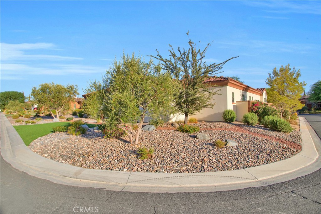 6 Cassis Circle Rancho Mirage, CA 92270 - Photo 10 of 74 front view of a house with a yard