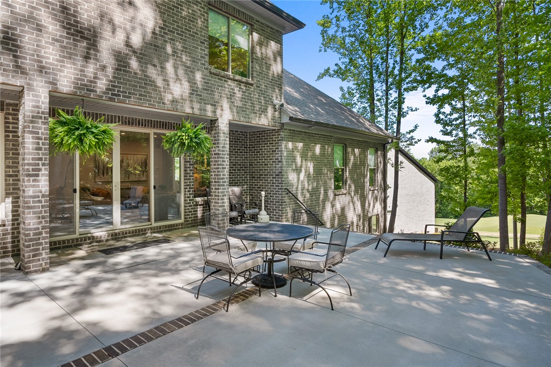 140 Turnberry Road Anderson, SC 29621 - Photo 29 of 44 This spacious patio offers an idyllic setting for outdoor enjoyment.
