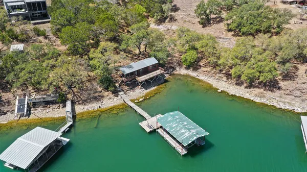 an aerial view of a house with a garden
